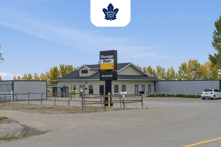 Facility exterior with Toronto Maple Leafs logo at StorageMart in Airdrie